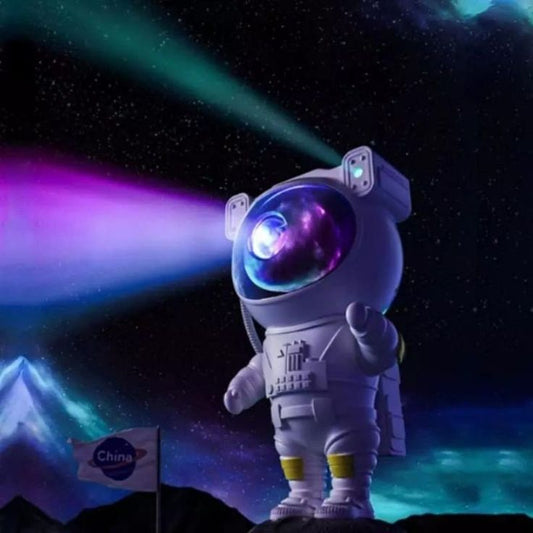 white Astronaut projector- front angle- purple, green,blue light-space-stars-illuminating