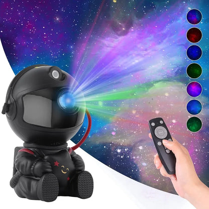 black astronaut- projection- green purple blue light- galaxy- stars